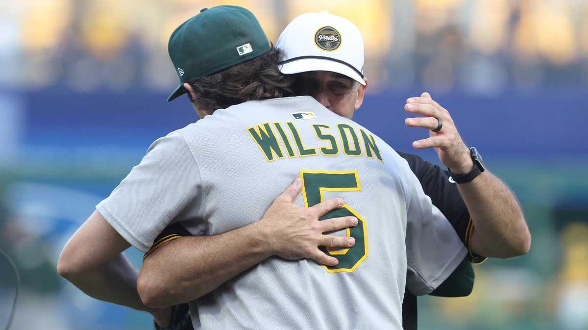 Athletics’ Jacob Wilson catches opening pitch from father Jack in full circle moment_thumbnail